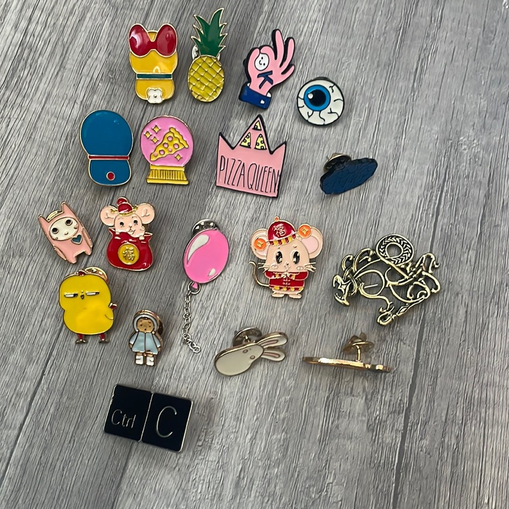18 enamel pins